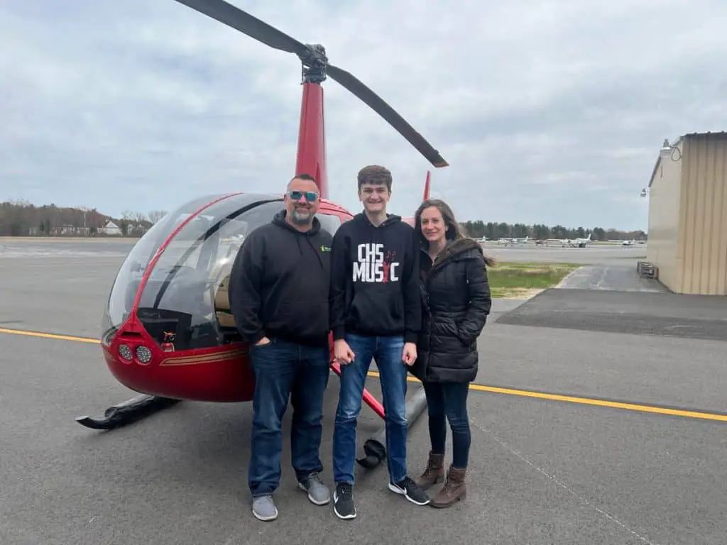 group photo of NH Helicopter tour