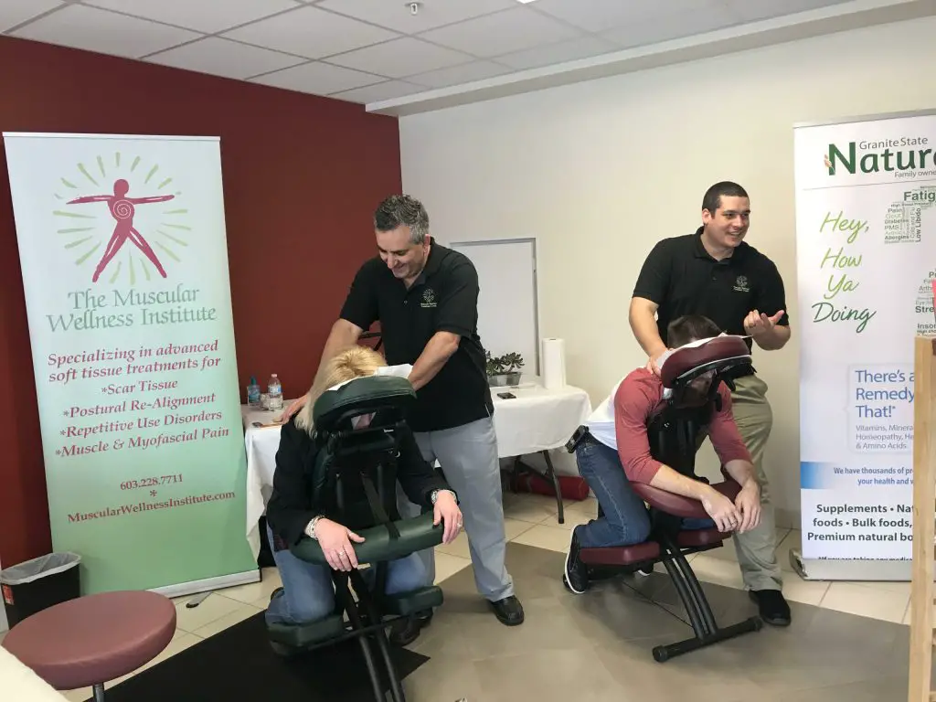 Jeff Madadeen doing a chair massage